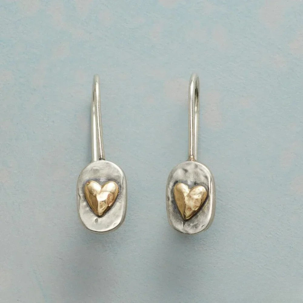 Vintage Silberohrringe mit goldenem Herzen