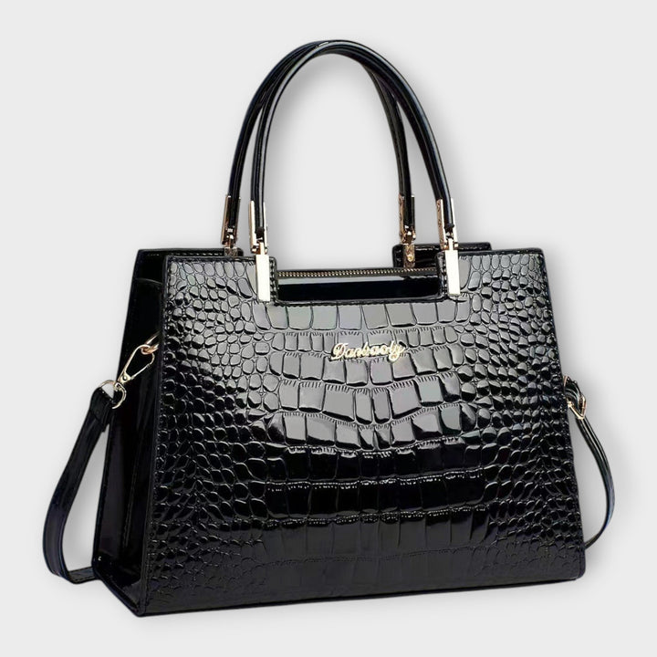 Lora. - Glänzende Krokodilledermuster-Handtasche