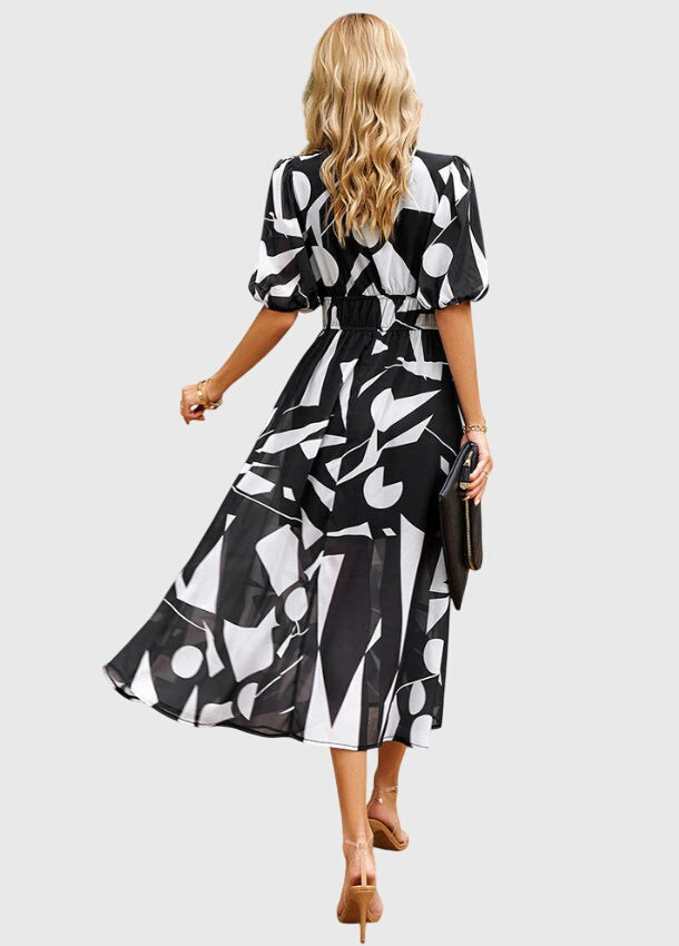Merlin™ | Figurbetontes Blumendesign Midi-Kleid
