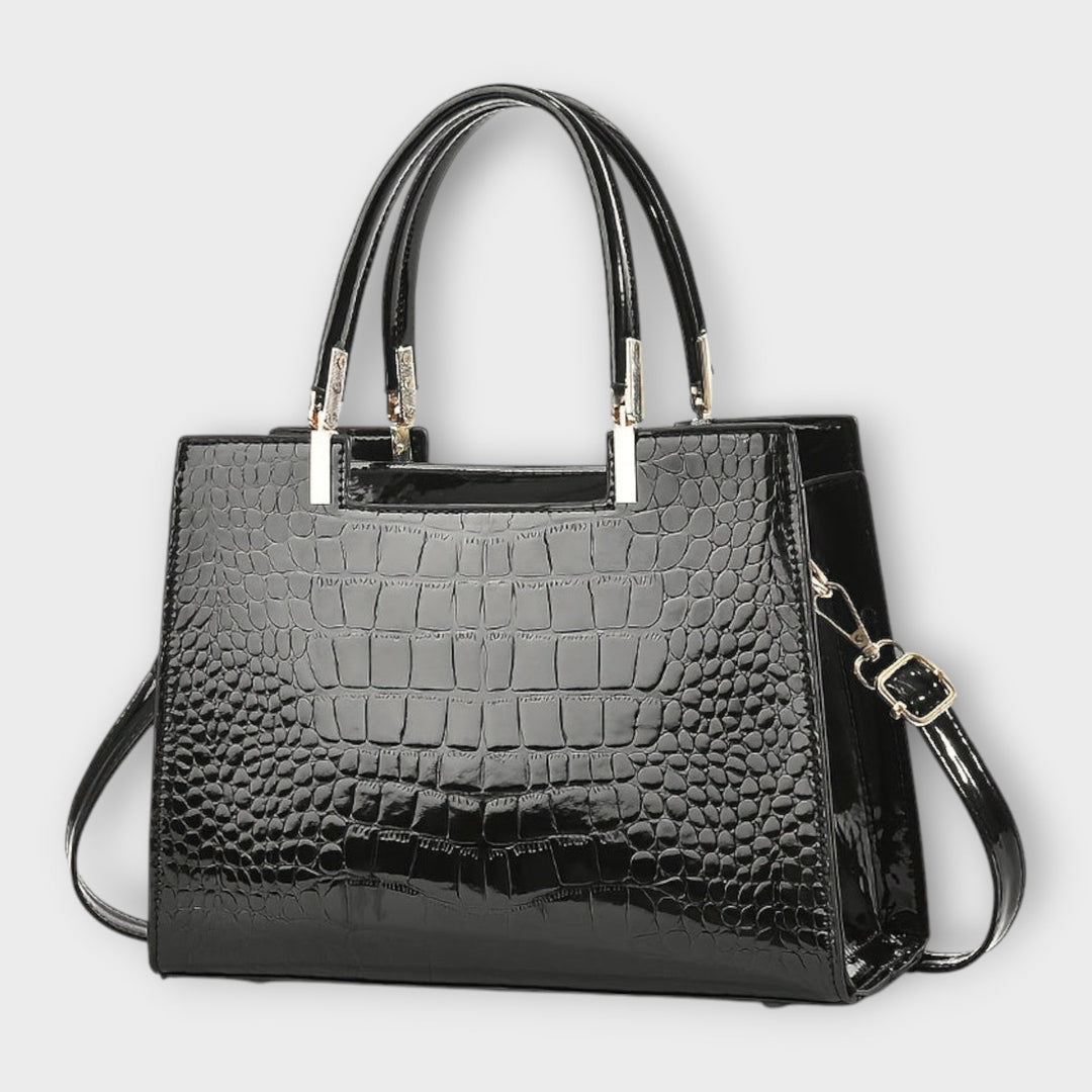 Lora. - Glänzende Krokodilledermuster-Handtasche