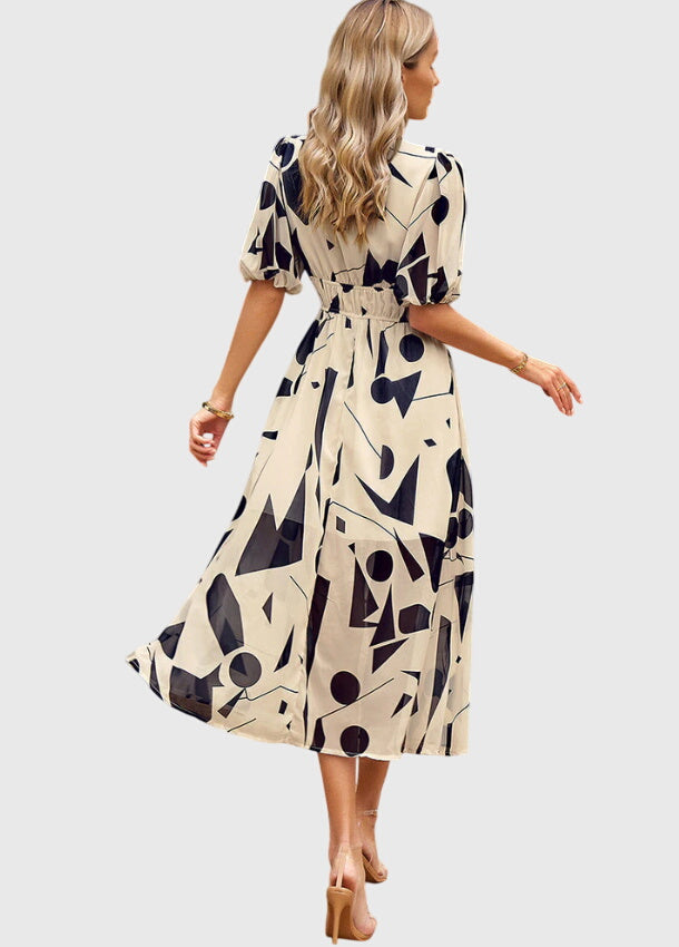 Merlin™ | Figurbetontes Blumendesign Midi-Kleid