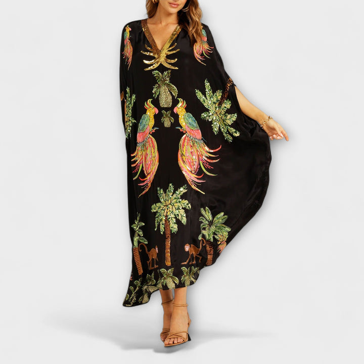 Linda - Auffälliges Kleid mit schrägen Schultern und Kokosbaum-Print