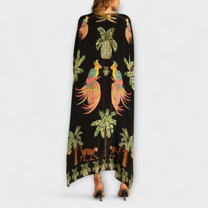 Linda - Auffälliges Kleid mit schrägen Schultern und Kokosbaum-Print