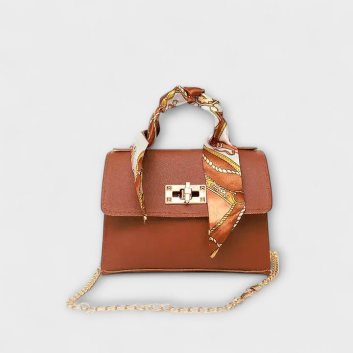 Lora. - Handtasche